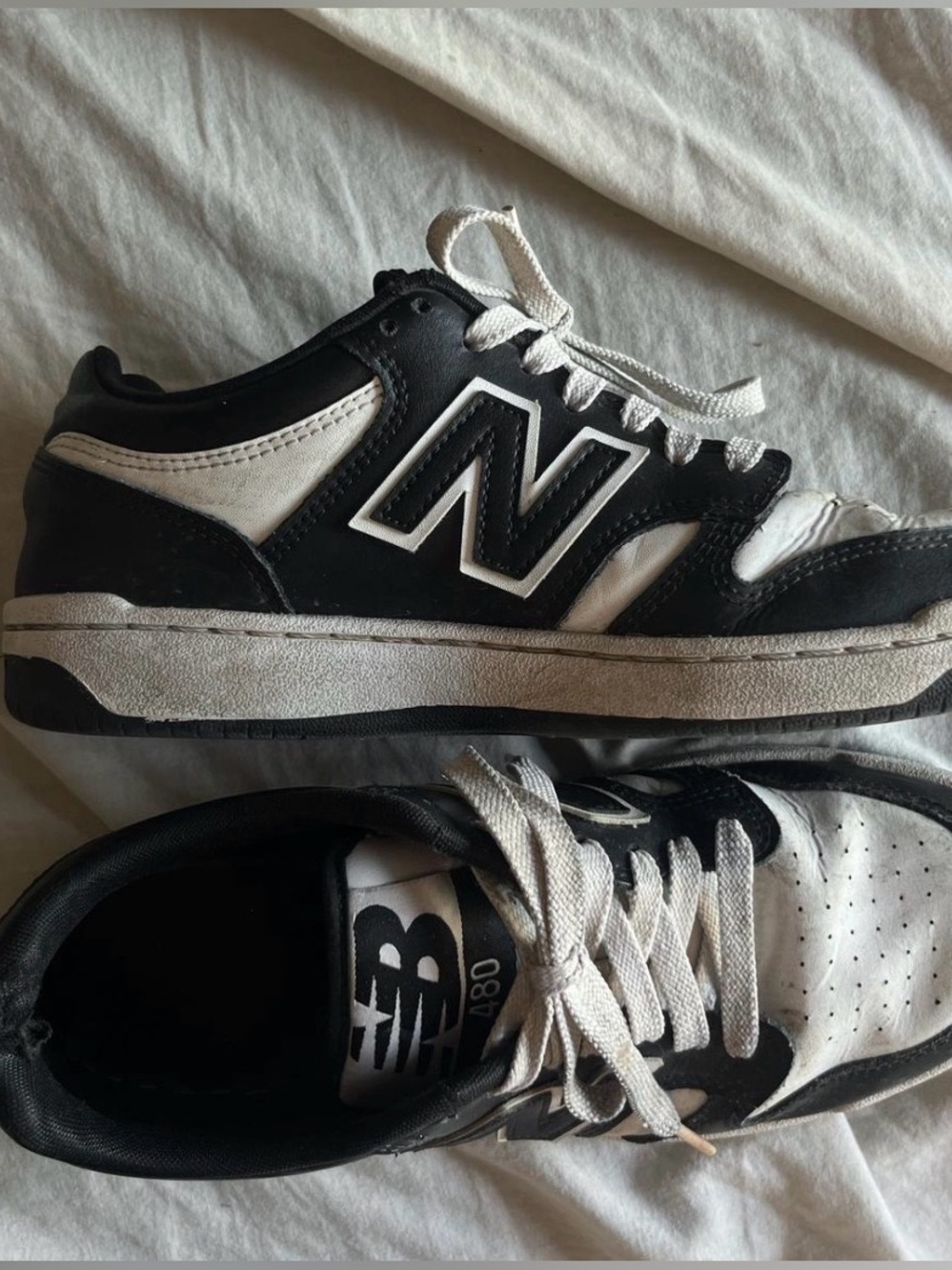 New Balance Men’s Black and White Low-Top Sneakers